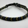 black with yellow and jacaranda braid over a rolled collar